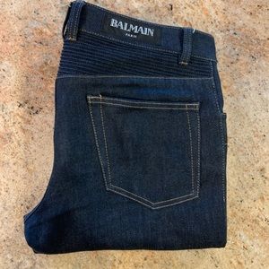 Balms on slim biker denim